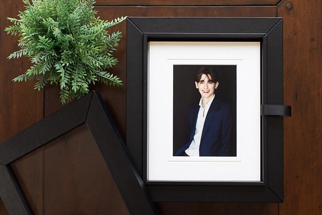 senior boy in studio photo shoot printed into folio box